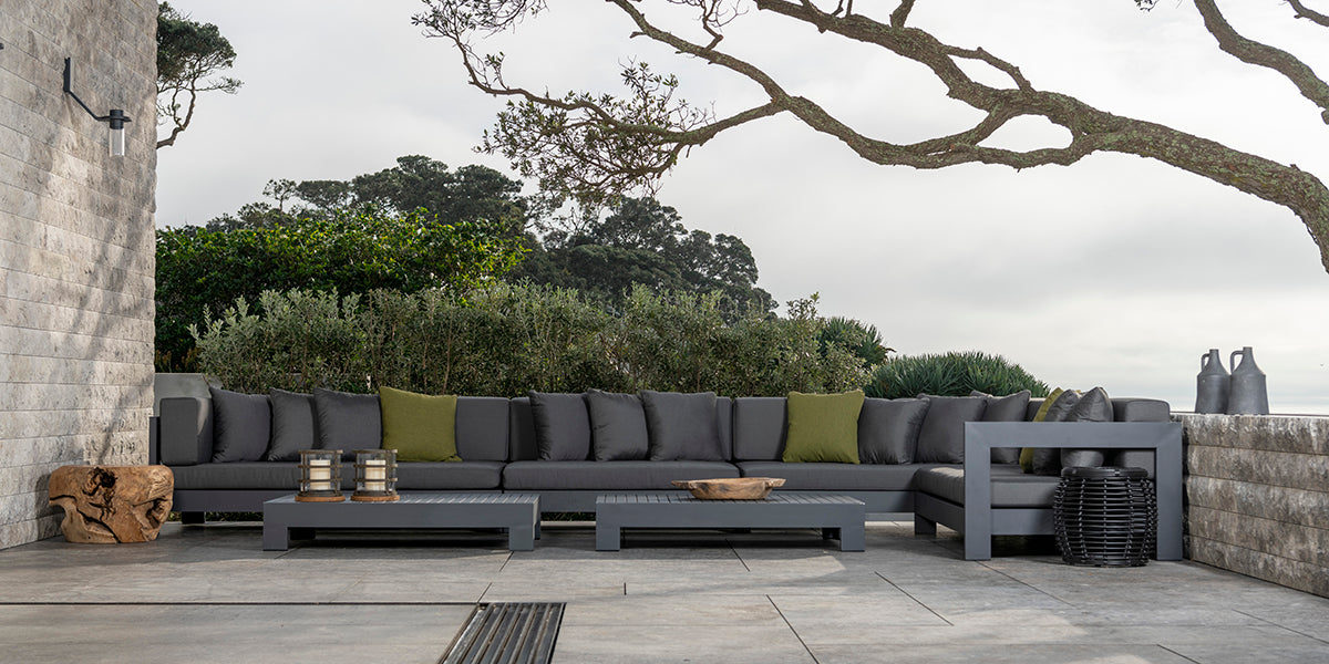 Amalfi outdoor aluminium modular furniture collection on patio.