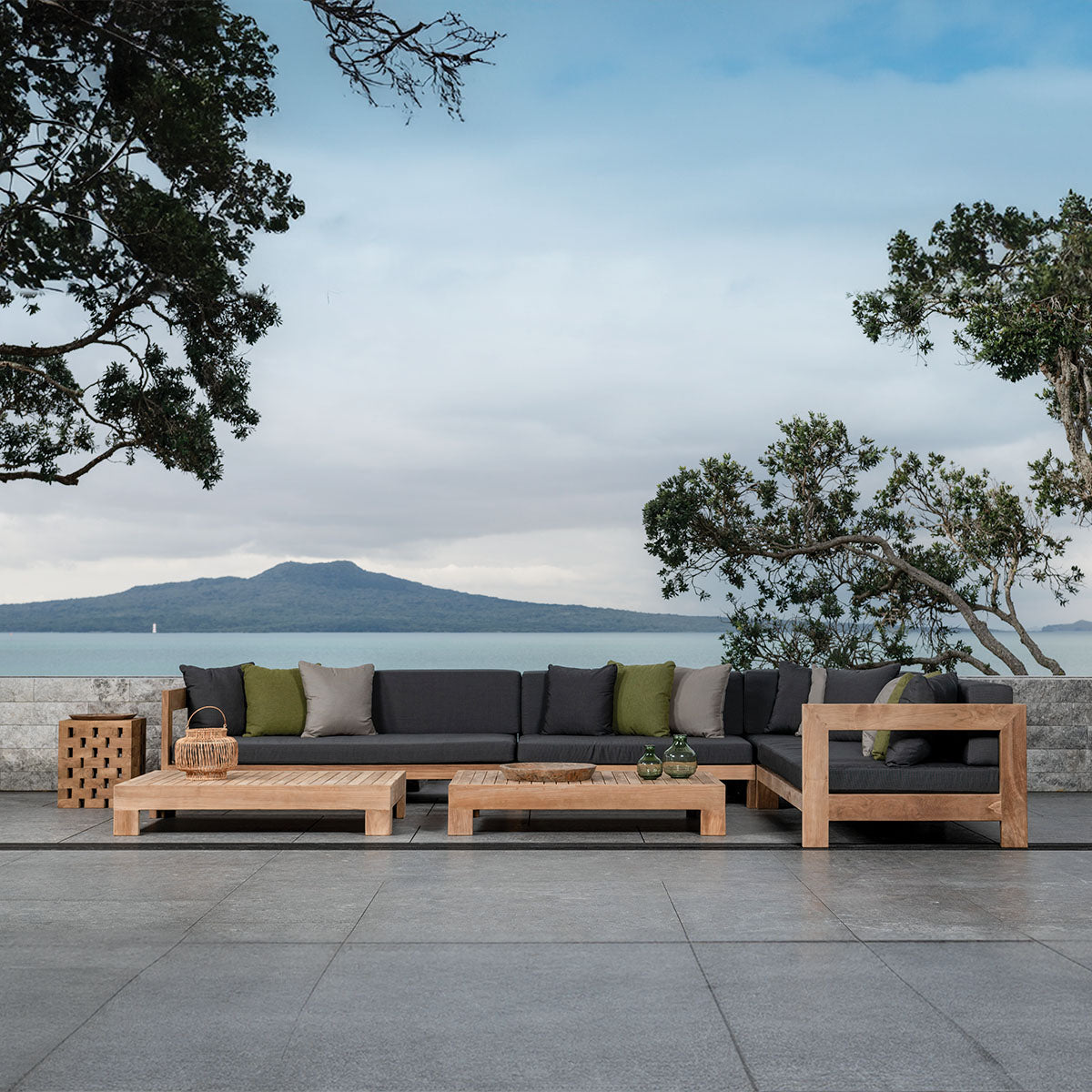 Amalfi teak modular furniture collection  on beachfront patio.