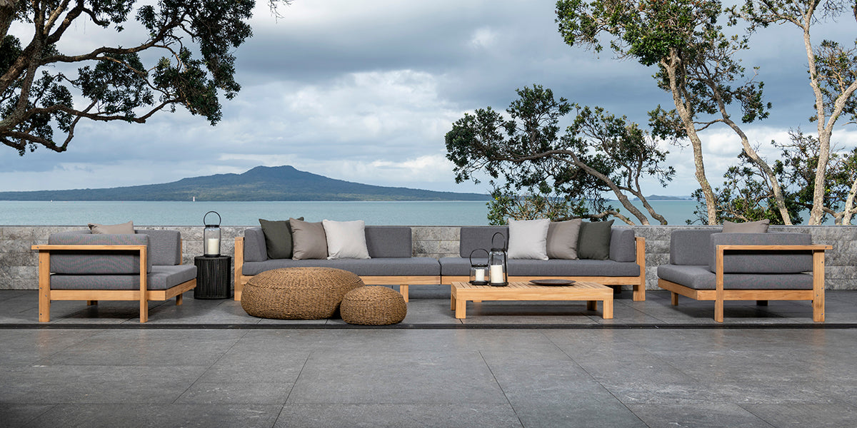 Cabo teak modular furniture collection in situ on oceanside patio.