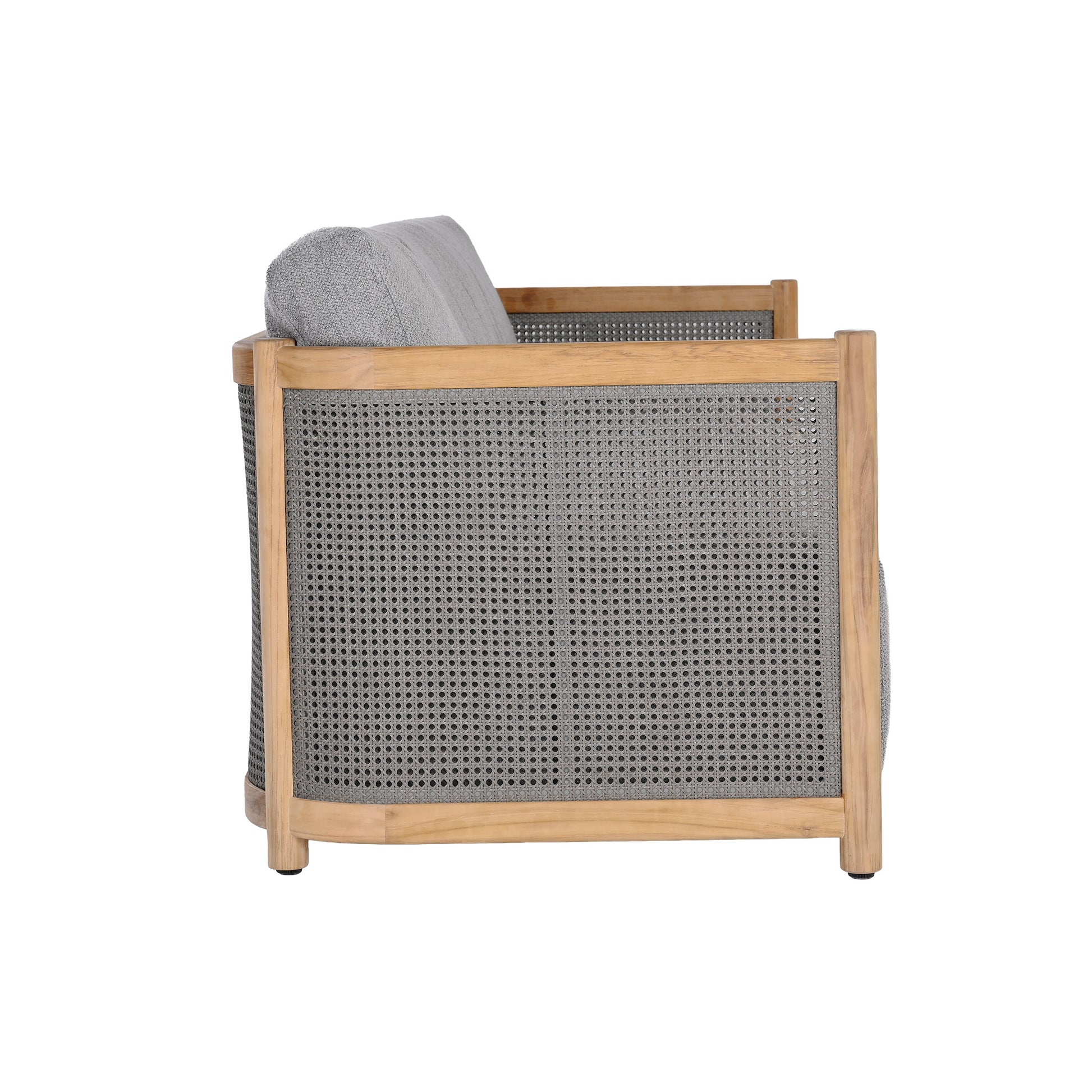 Florida outdoor teak and cane weave sofa with plush seat and back cushions. Side view.