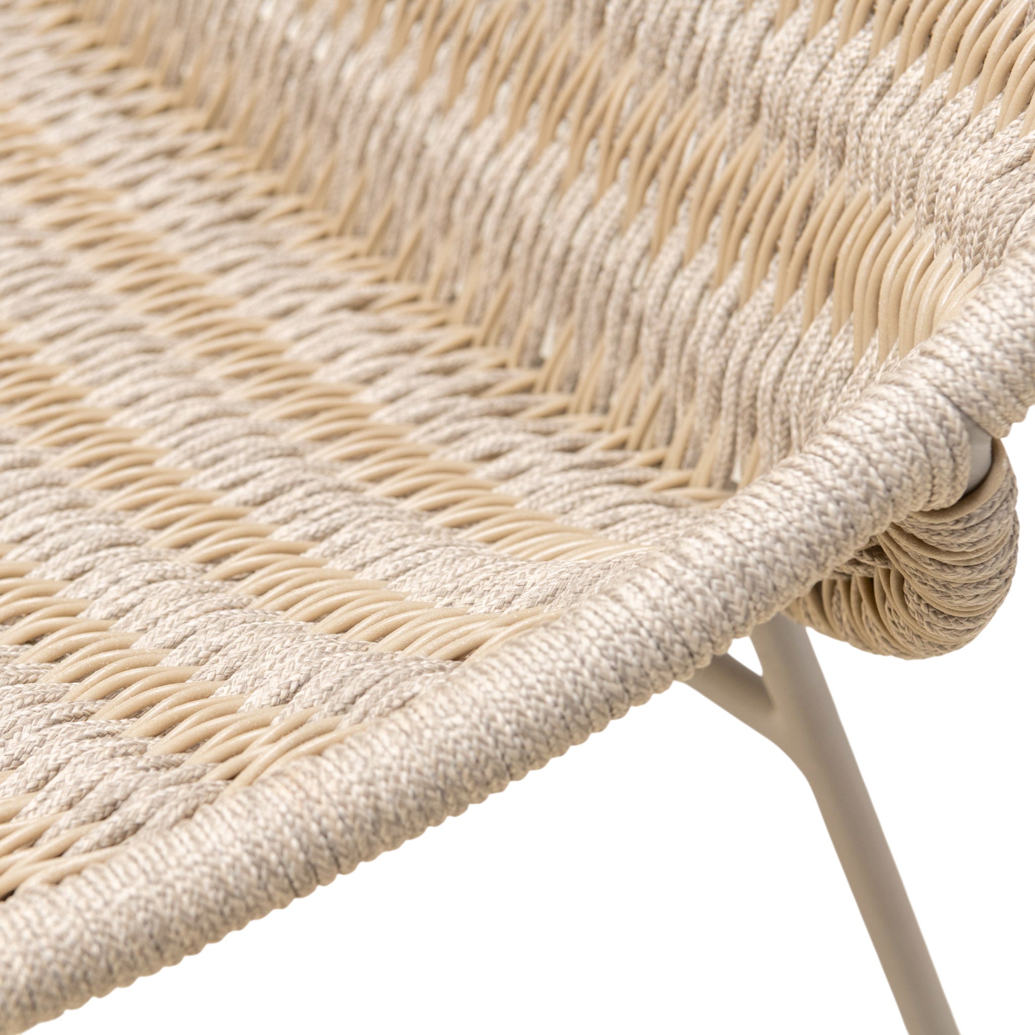 Amelia outdoor lounge chair with slim frame and resin woven weave in a linen colour. Close up view.