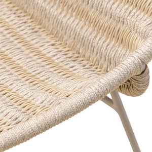 Amelia outdoor lounge chair with slim frame and resin woven weave in a linen colour. Close up view.