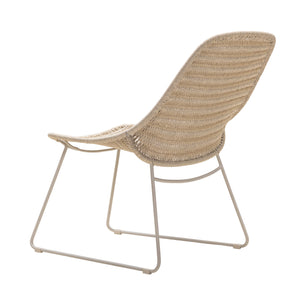 Amelia outdoor lounge chair with slim frame and resin woven weave in a linen colour. Rear angle view.