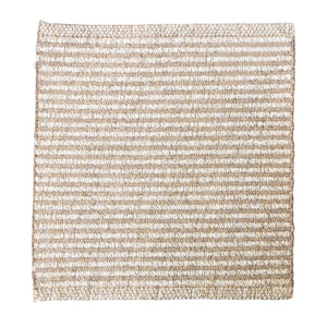 Full image of Avela outdoor handwoven rug in natural light brown tones with a subtle linear weave pattern.
