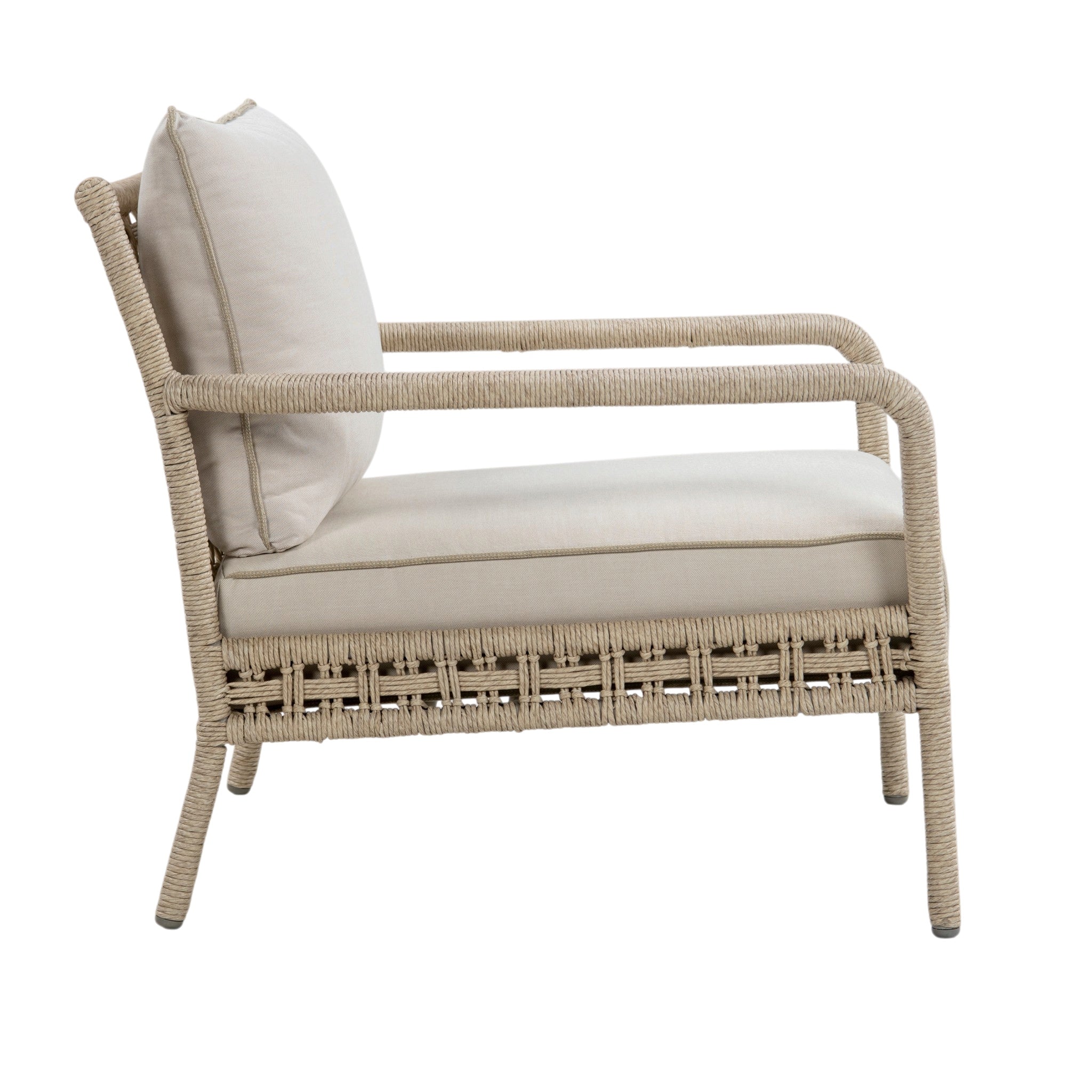 Outdoor lounge chair with beige rope-wrapped frame, open woven backrest, curved armrests and light beige seat and back cushions. Side view.