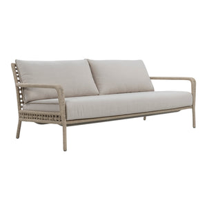 Three-seater outdoor sofa with rope-wrapped aluminium frame, open woven backrest and linen-coloured seat and back cushions. Front angle view.