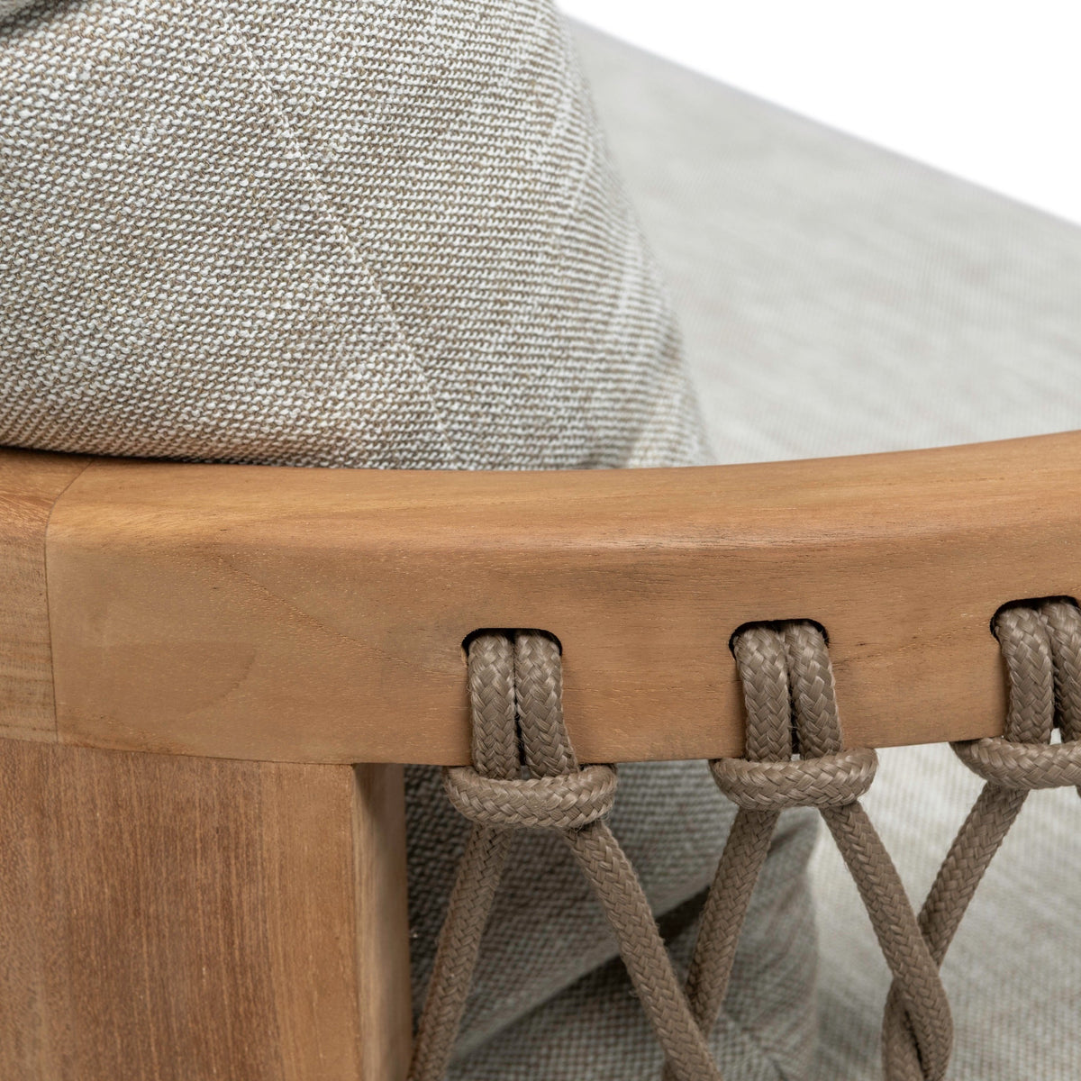 Bologna Teak and Rope Outdoor 3-Seater Sofa with natural teak frame and rope-woven sides and light grey seat and back cushions. Closeup view.