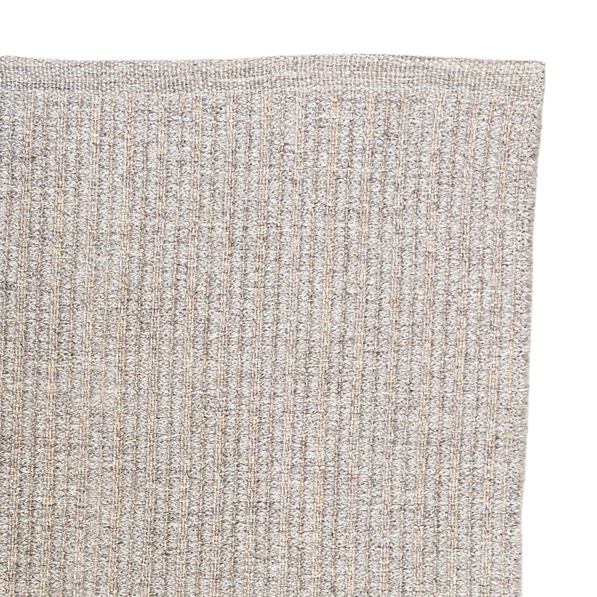 Close-up of a textured canvas, light brown coloured rug on a white background
