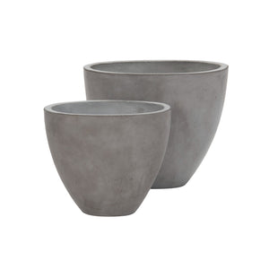 Large and medium sized Brooklyn oval concrete planters side by side on white background. Front facing view.