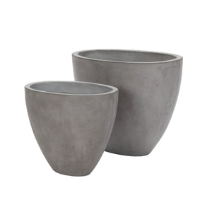 Large and medium sized Brooklyn oval concrete planters side by side on white background.