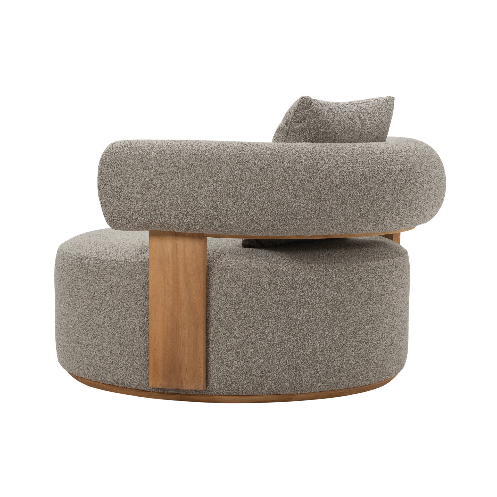 Cap Ferrat teak lounge chair with pillow and rounded seat and back rest teak frame.