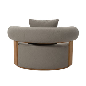 Cap Ferrat teak lounge chair rear view of round back and seating. Showing plush seating cushion and a single back rest pillow. 
