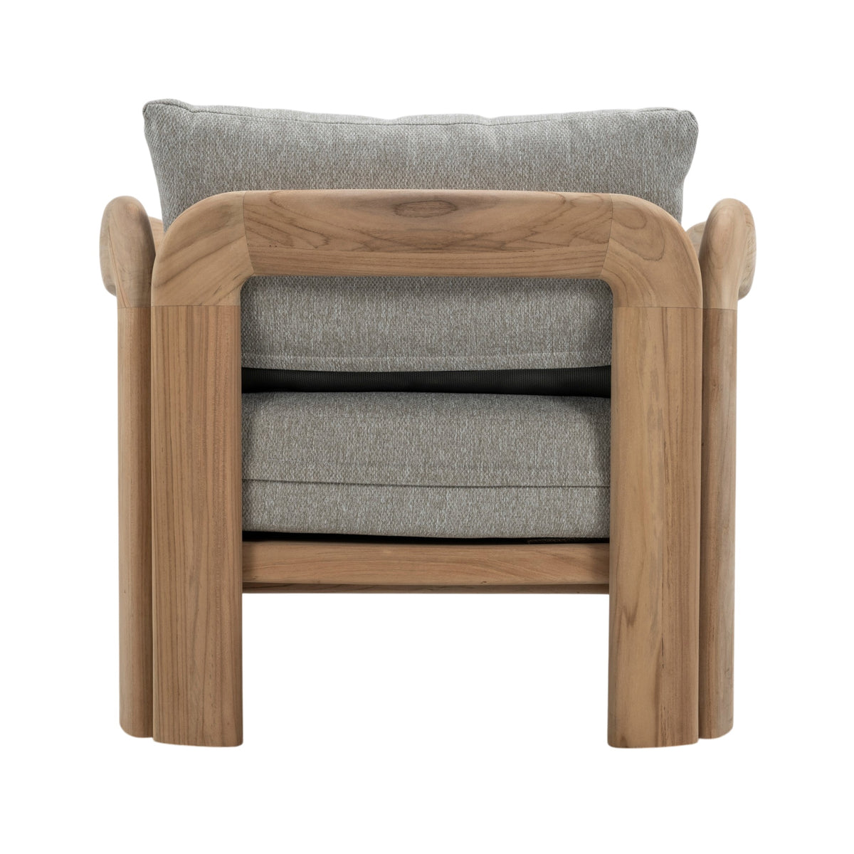 Rear view of Caribbean outdoor lounge chair showing solid teak construction, curved armrests and natural timber grain