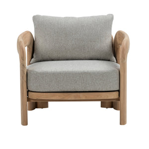 Front view of Caribbean teak outdoor lounge chair showing natural timber frame, padded grey seat cushion and large back cushion