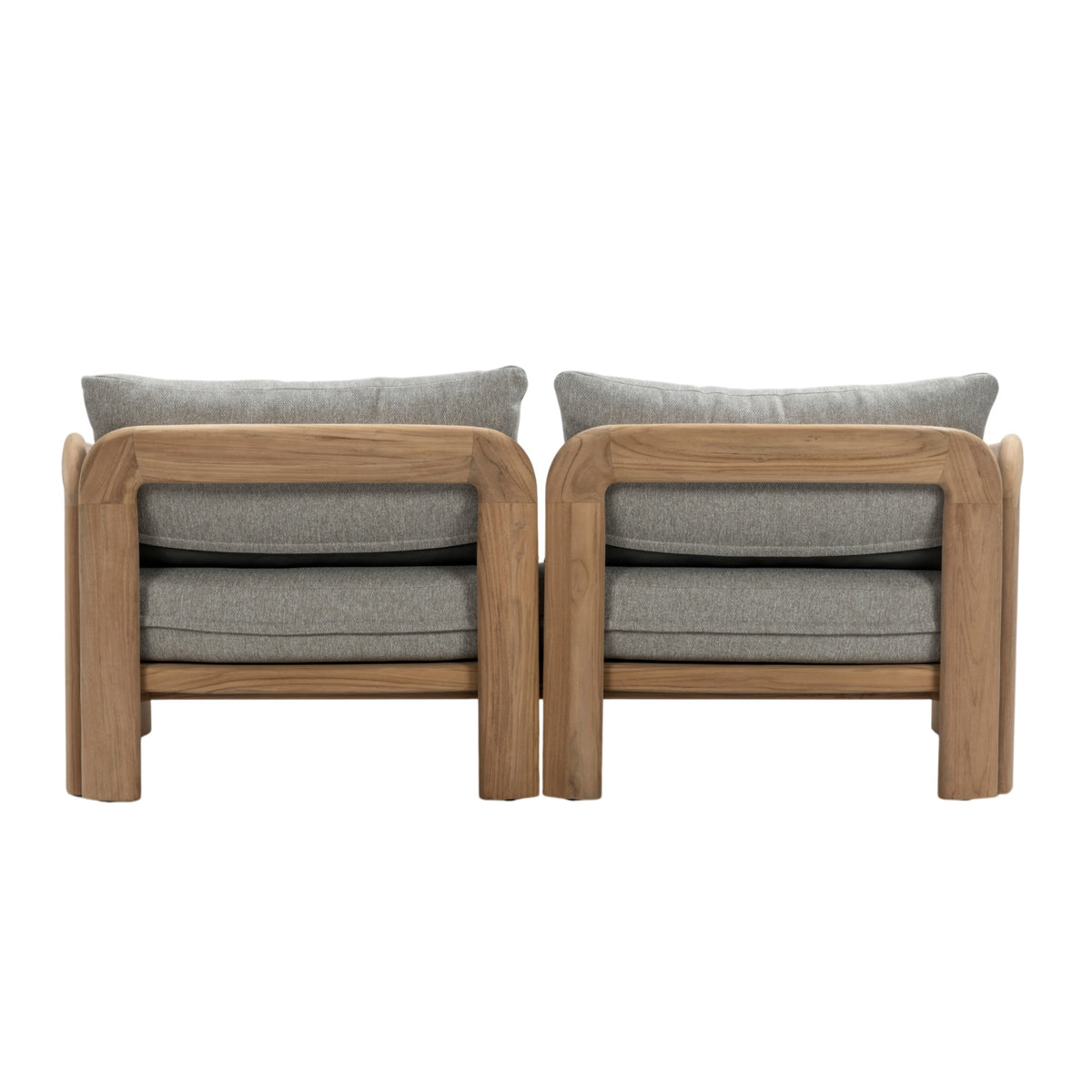 Rear view of Caribbean outdoor two-seater sofa showing solid teak frame, curved armrests and exposed timber grain
