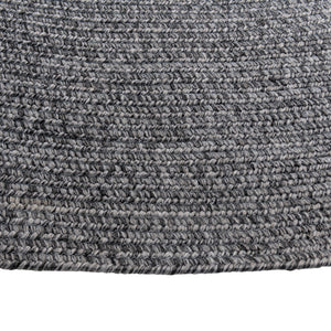 Cirra outdoor round handwoven floor rug in dark gray closeup.