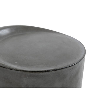 Close-up of a dark gray concrete stool with a smooth, matte finish on a plain white background.
