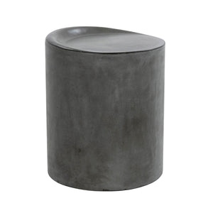 A dark gray concrete stool with a rounded, organic-shaped top, shown against a plain white background.