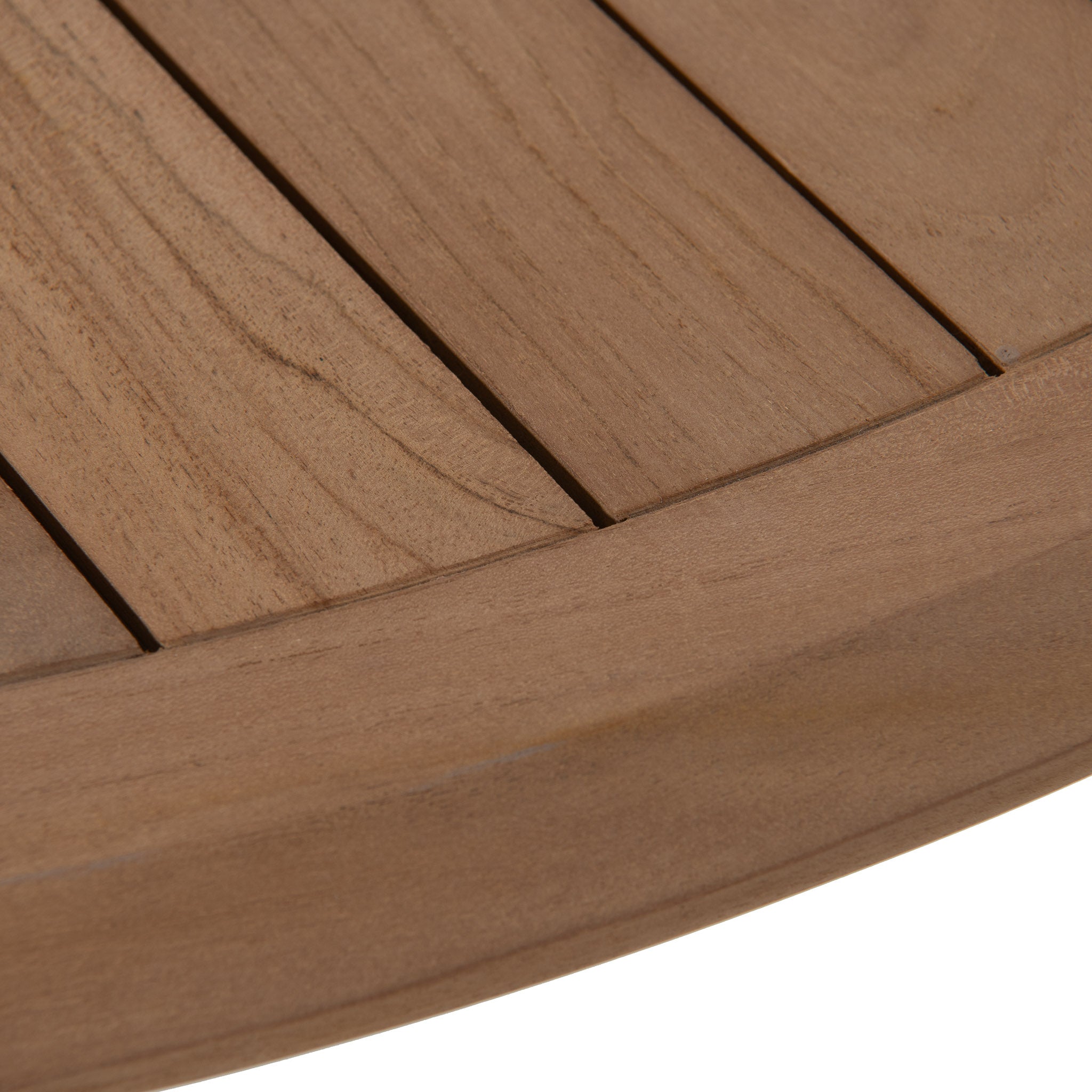 Closeup of Corfu round teak dining table top. 