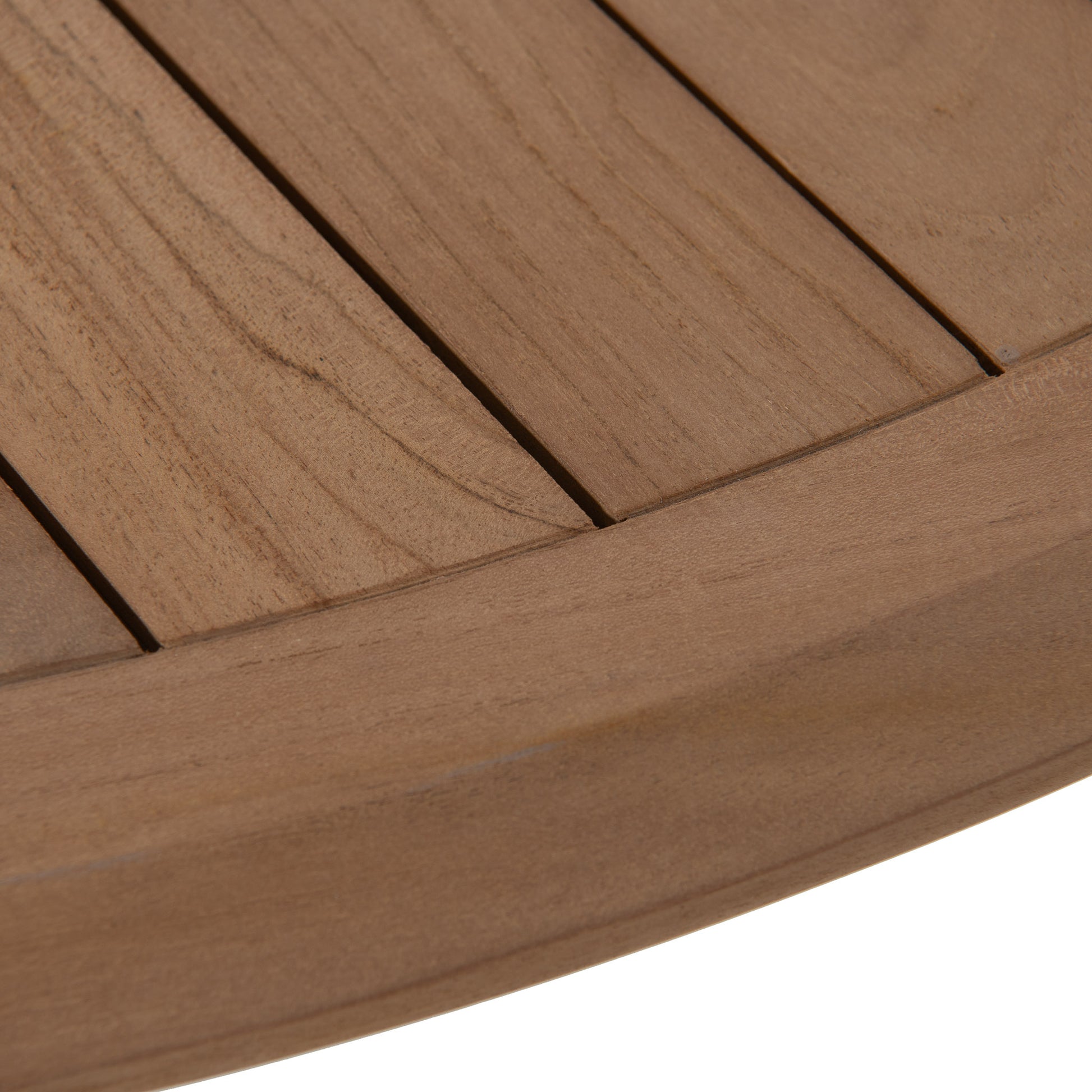 Closeup of Corfu round teak dining table top. 