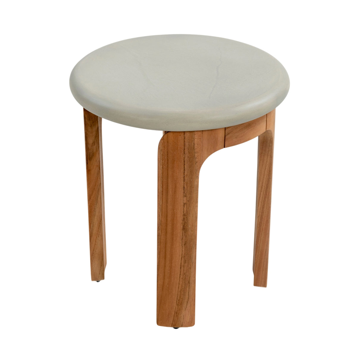 Angled overhead view of concrete and teak round side table showing tabletop and three-legged construction