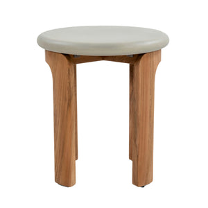 Elevated view of concrete and teak outdoor side table showing round tabletop and curved timber supports