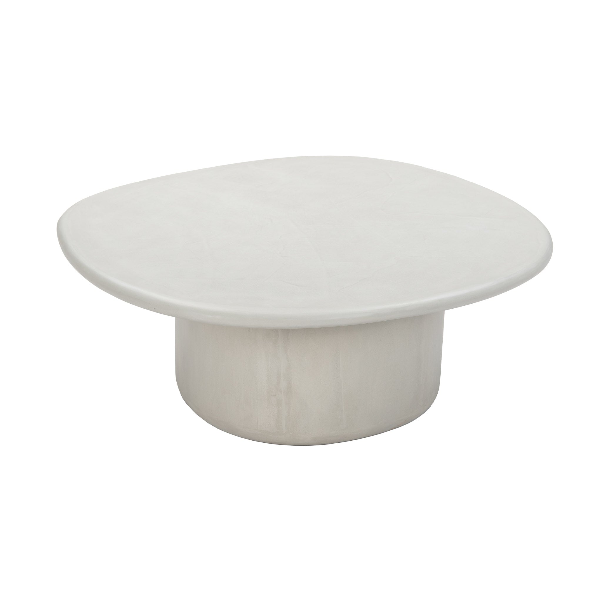 Outdoor oval coffee table in soft off-white concrete with smooth contours and rounded base