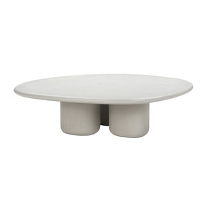 ide angle of off-white oval outdoor table with three sculptural legs