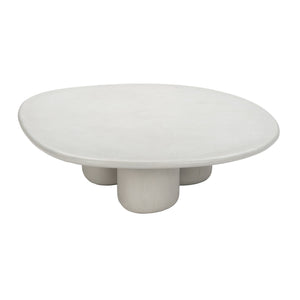 Angled view of Linen finish concrete triad coffee table with smooth oval top