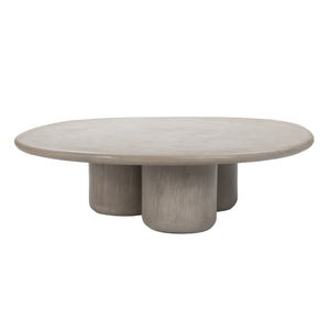 Angled view of Wasabi concrete triad coffee table with sculptural base
