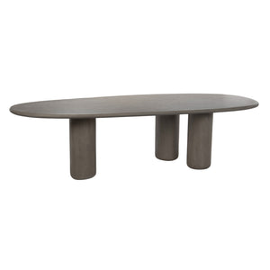 Top-down view of Wasabi concrete dining table with curved form