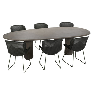 Wasabi finish dining table shown with six outdoor chairs (styled scene)