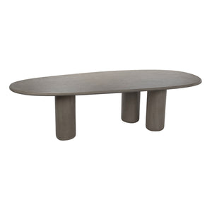 Elliptical outdoor dining table in Wasabi concrete with three rounded legs