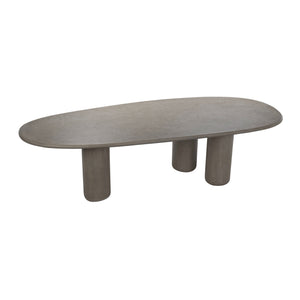 Side view of grey concrete triad dining table showing sculptural base