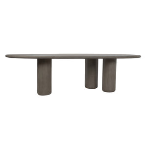 Front-facing view of grey concrete table with three-leg base