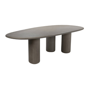 Top-down view of Wasabi concrete dining table with curved form