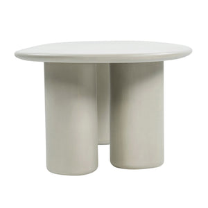 End view of Triad 215 cm concrete low dining table in Linen with three cylindrical pedestal legs