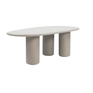 Curve Triad 215 cm low outdoor dining table in Wasabi varnished concrete with three cylindrical pedestal legs