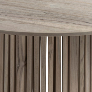 Closeup view of Federico outdoor bar table with round aged teak top and slated base.