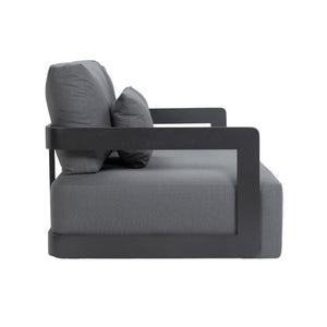 Franco aluminium 2-seater sofa with deep seating cushions and back pillows. Side view.