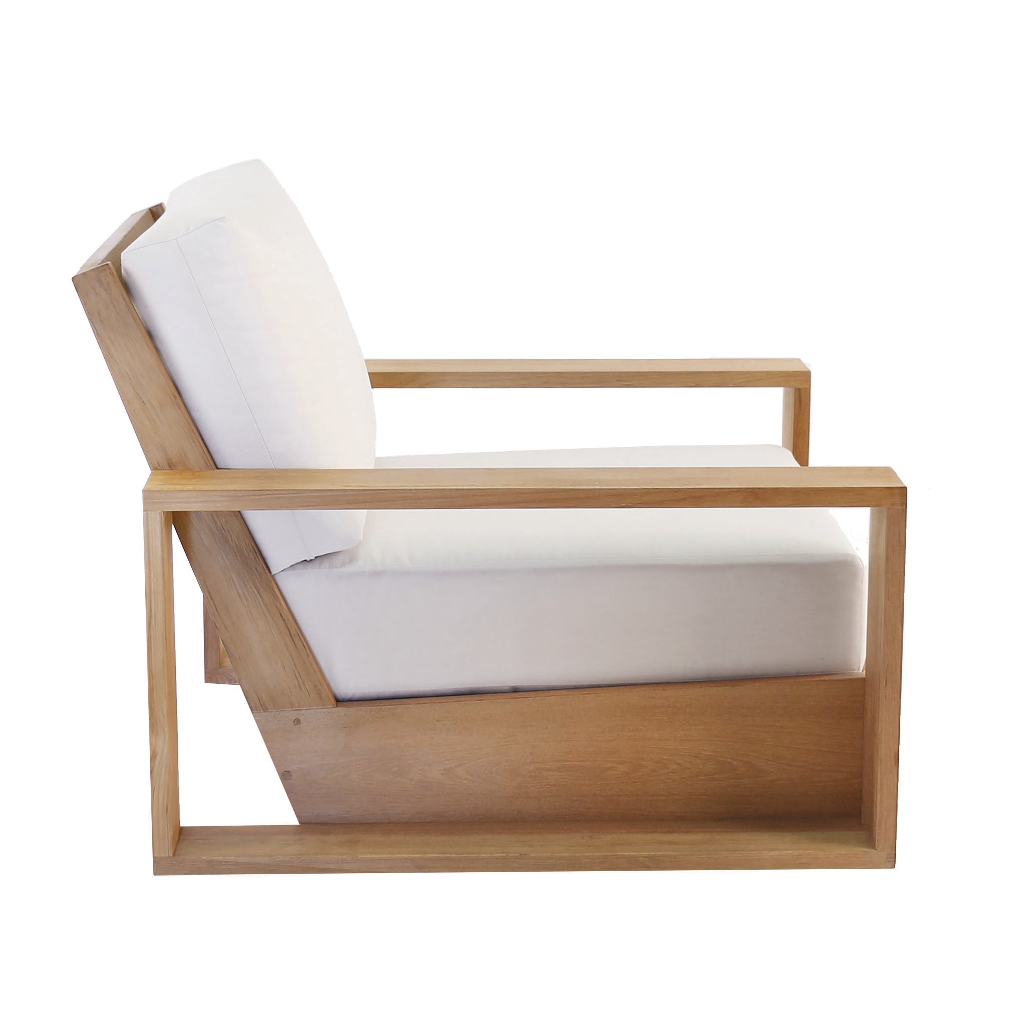 Kuba outdoor teak lounge chair with thick planks of teak wood frame and deep plush cushions. Side view.