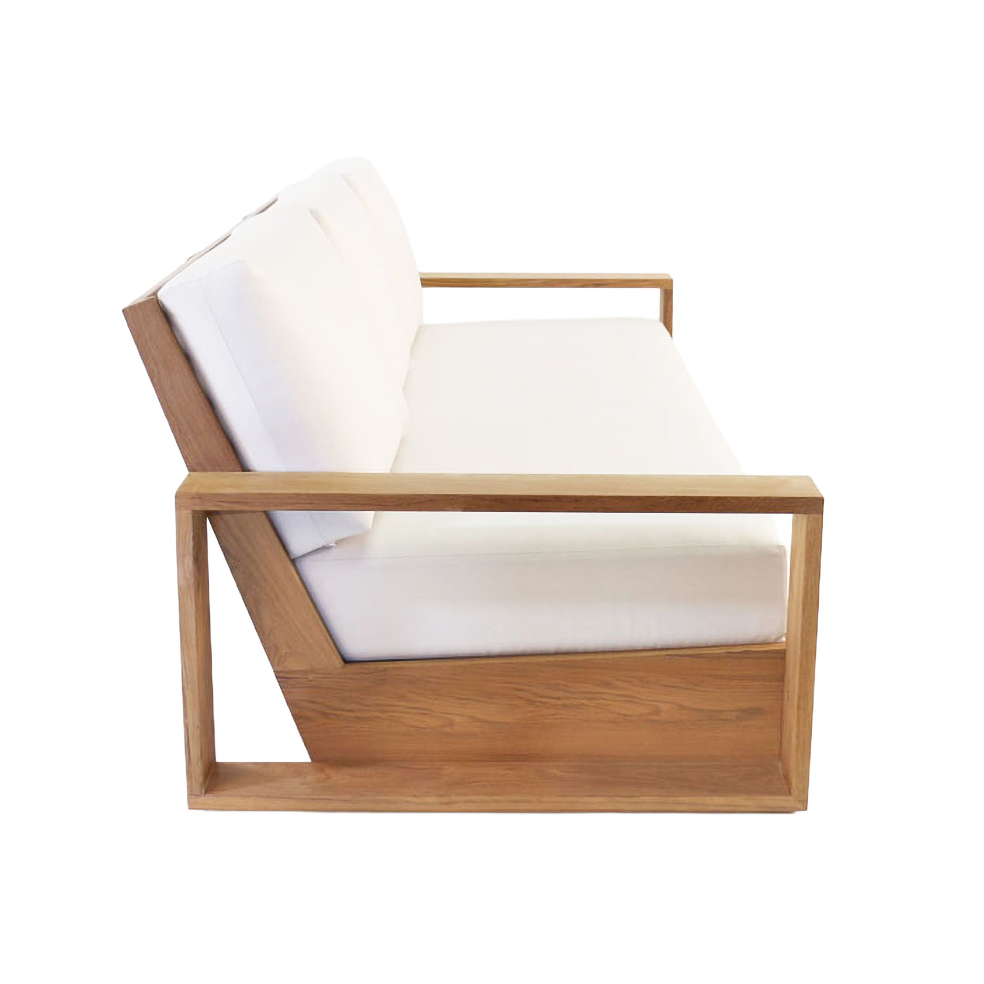 Kuba teak wood sofa with thick planks and  white deep seating cushions. Side view.