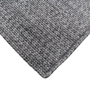 Dark and light grey Linda outdoor handwoven rug closeup view.
