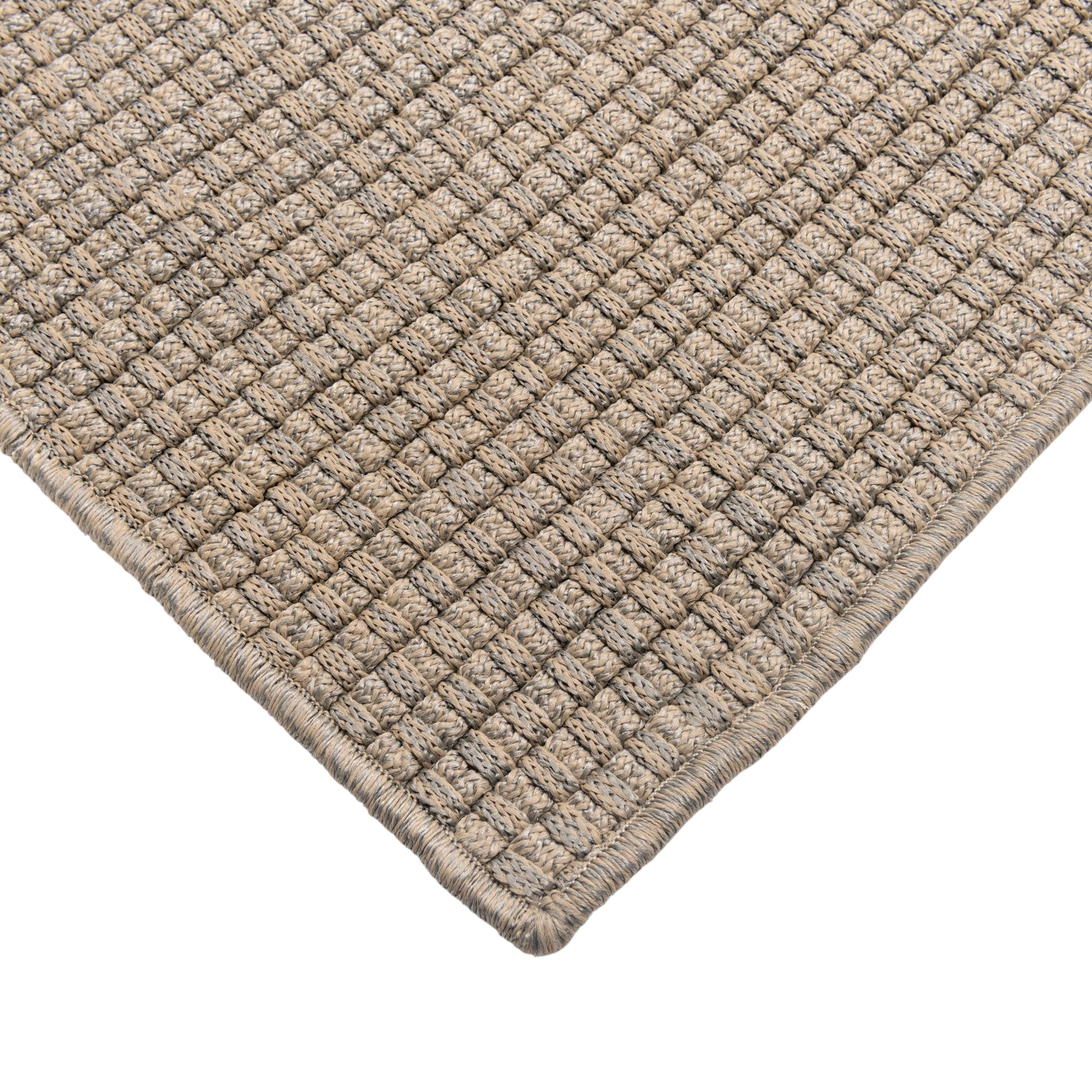 Closeup view of Luma handwoven floor rug corner.