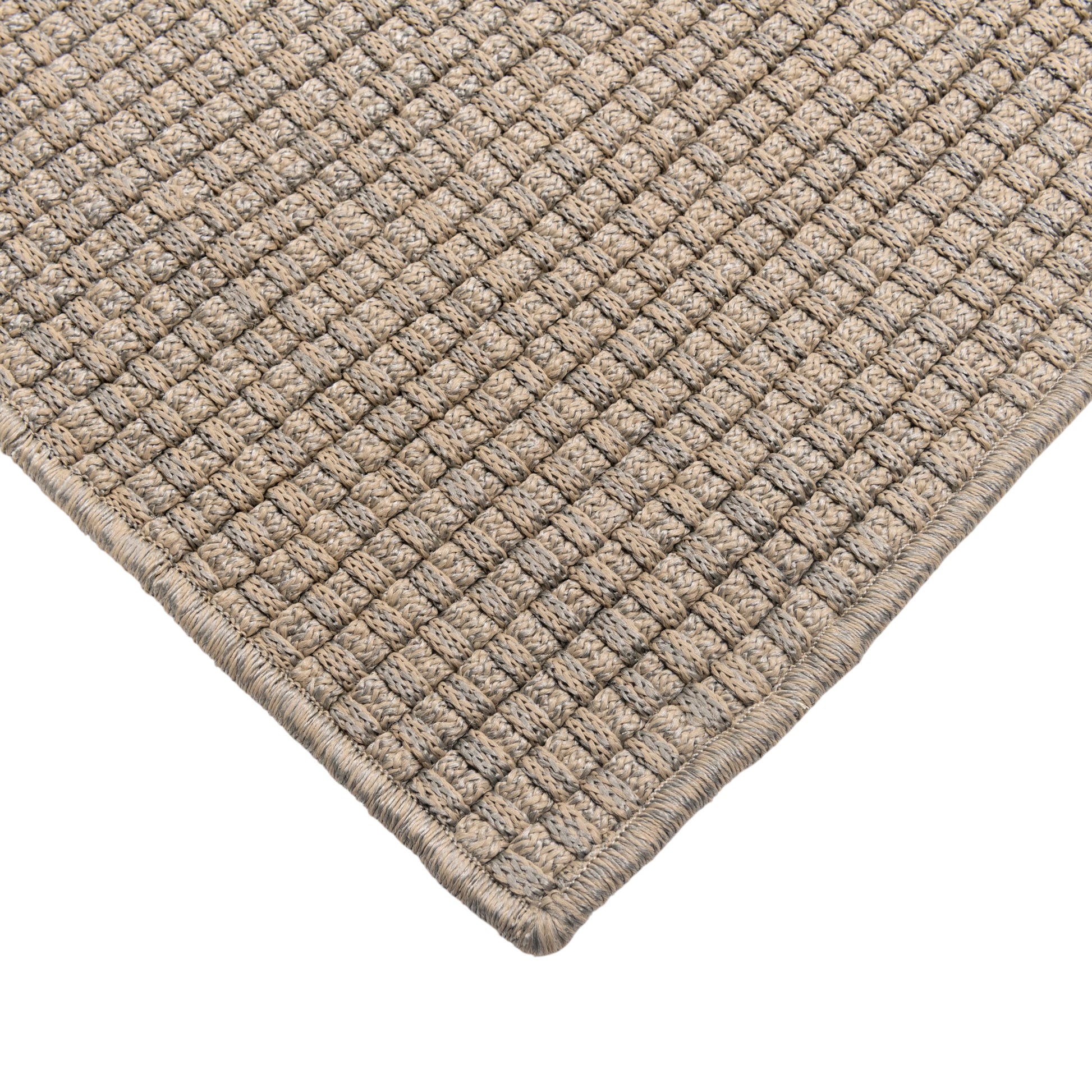 Closeup view of Luma handwoven floor rug corner.