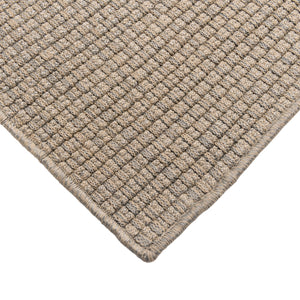 Closeup view of Luma handwoven floor rug corner.