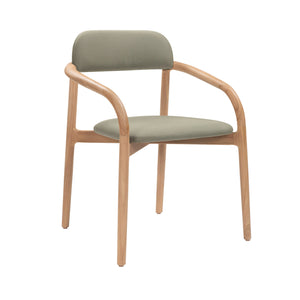 Angled front view of Marco Teak Outdoor Dining Armchair with Alga green cushions and curved teak frame