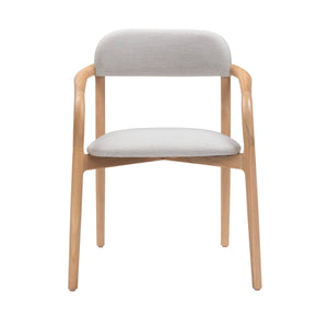 Front view of Marco Dining Chair showing soft curved backrest and Fossil seat cushion