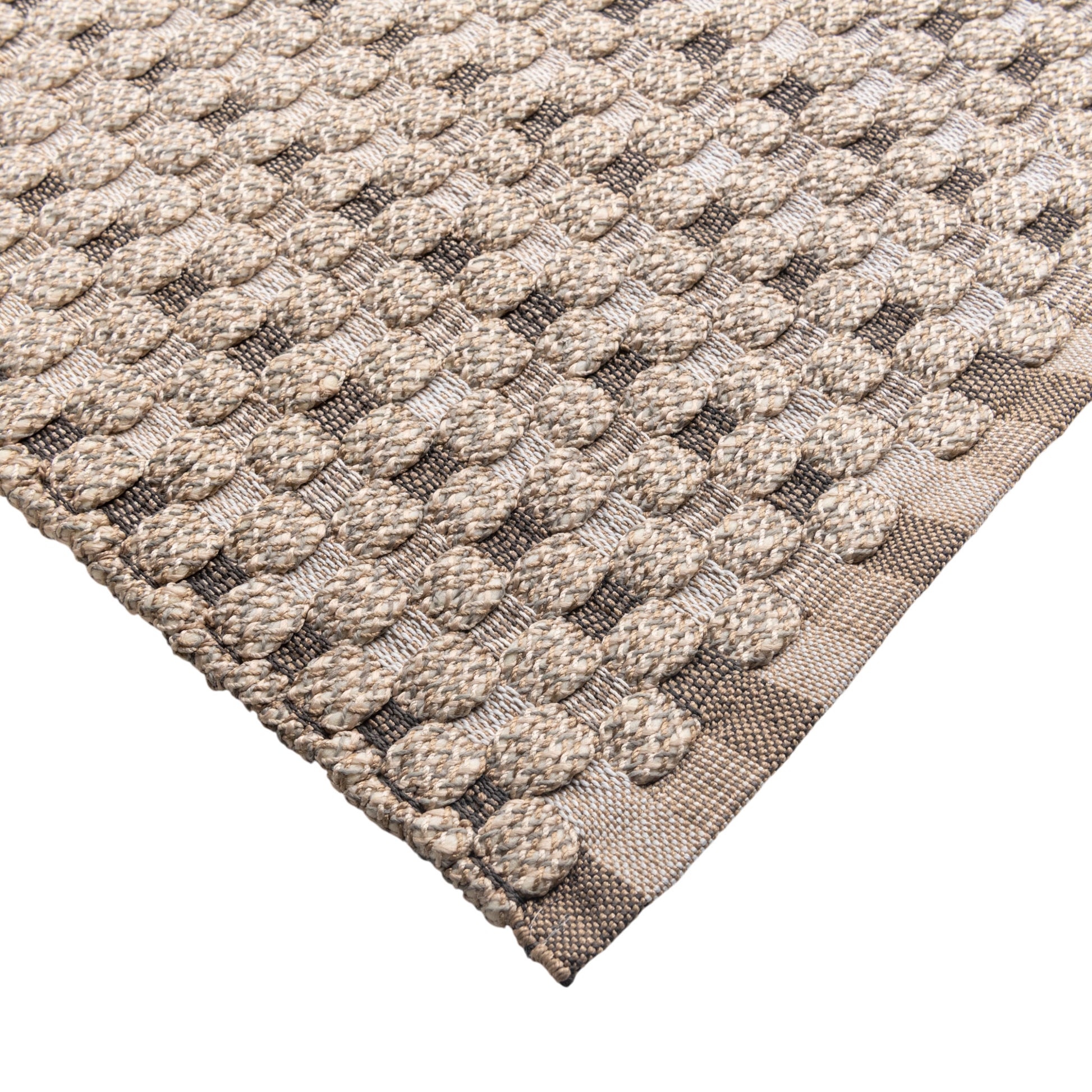 Close-up of a textured beige and brown rug with a geometric pattern on a white background.