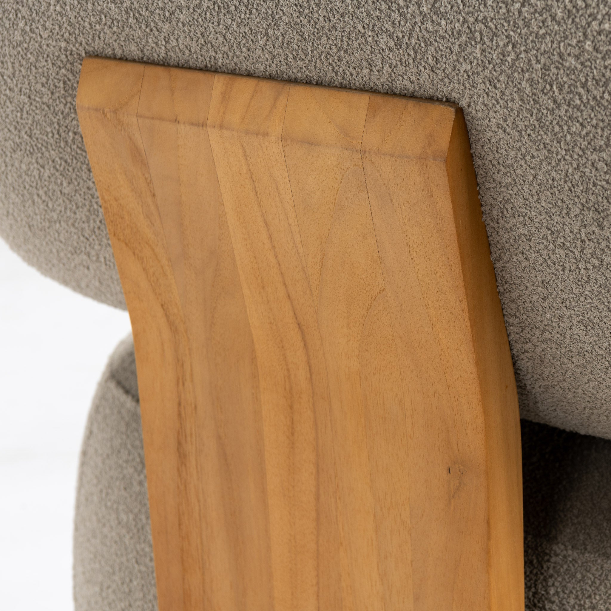 Closeup of teak wood backrest on Menton lounge chair